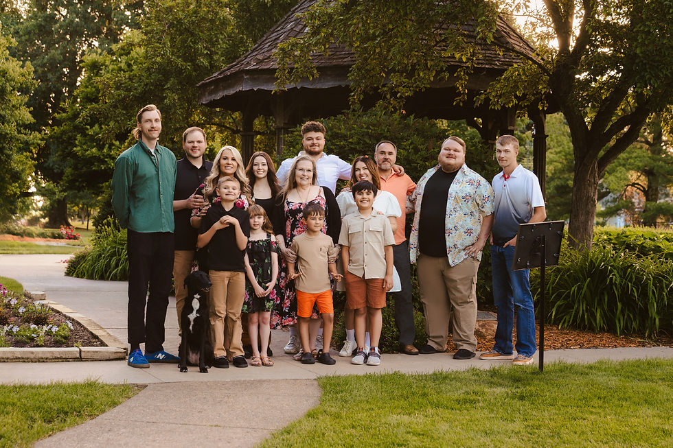 Norwalk and Des Moines, Iowa family photographer - large extended family session of fourteen individuals and one dog from school-aged to adult people