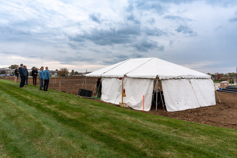 Des Moines, Iowa event photographer - view from the corner of the new DMOS Orthopaedic Center's Norwalk location that is overlooking the hill, tent, and construction site that will be the new center.