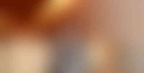 Des Moines branding photographer - Calli Tuggle Photography - woman standing next to barrels at a winery or brewery