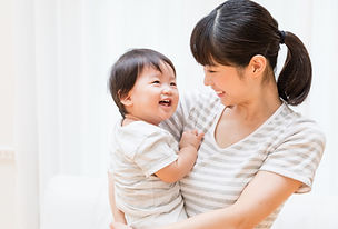 彼女の子供を持つ母親