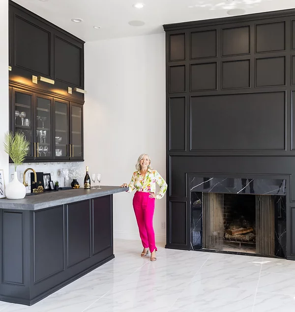french interior designer samia verbist standing in luxury newport beach home interior design