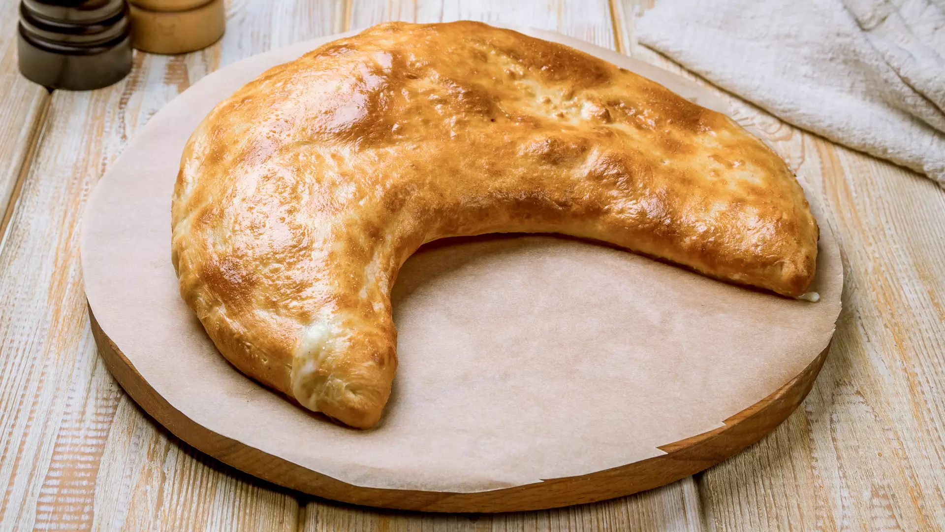 Guruli Ghvezeli, or Gurian Pie, a traditional Georgian Christmas khachapuri styled egg and cheese pie
