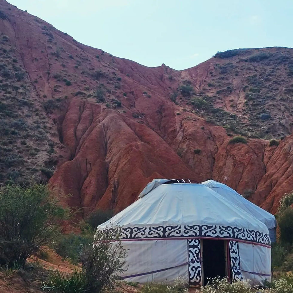 Traditional Kyrgyz yurt in a mountain valley, Central Asia tour