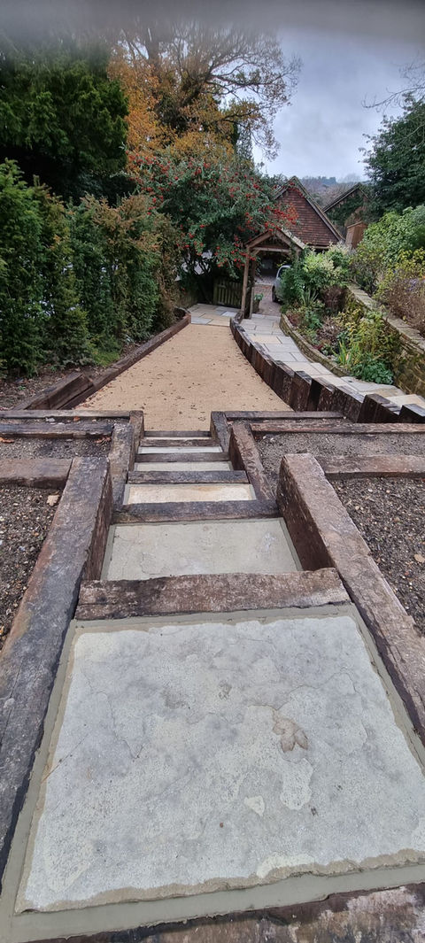 Garden redesign in Ewhurst - steps down to play area.jpg