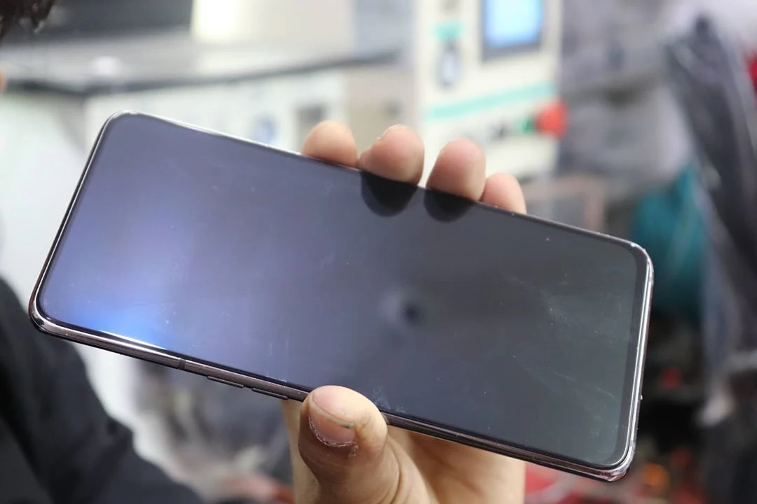 Person holding new smartphone screen