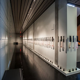Black and White installation at the Anchorage Museum. Acrylic polymer, glass beads, human hair, paper, canning jar, nylon thread, used motor oil, steel pins, dimensions variable. Photographs by the artist.