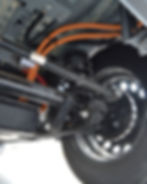 Motor listrik diletakkan di belakang dan menggerakkan roda belakang.