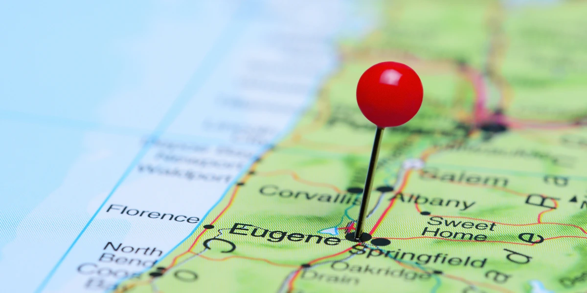A map of the USA with a red pin showing a local business