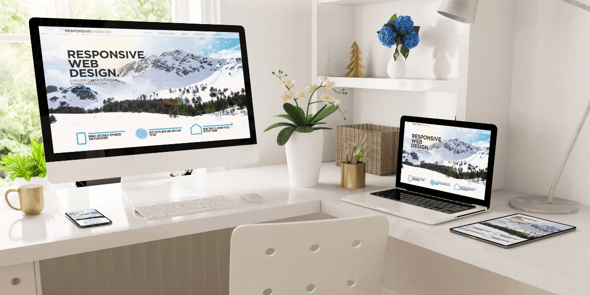 A tablet, laptop, and desktop displaying a website optimized for SEO with the best practices for mobile SEO optimization implemented.