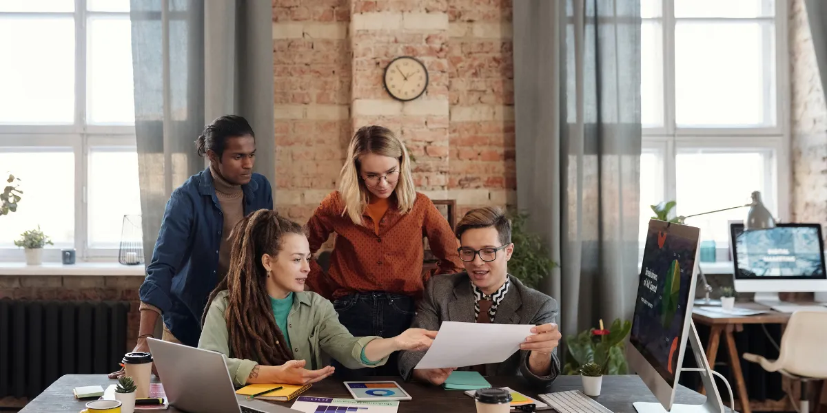 A group of people discussing the importance of national SEO