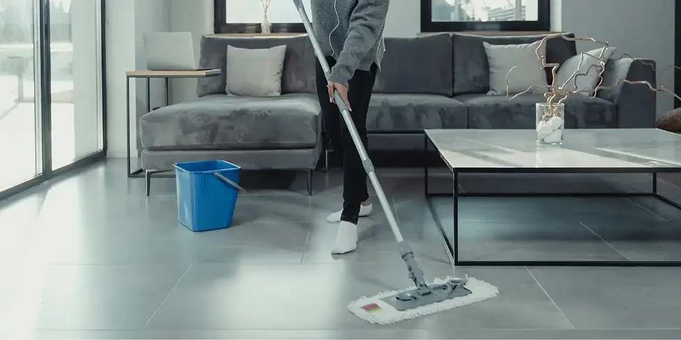 Woman mopping a tiled floor