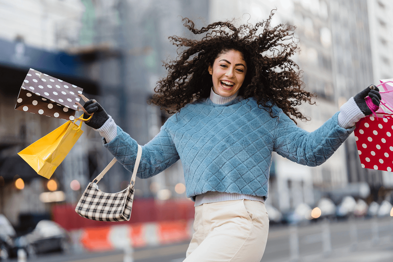 A woman carrying shopping bags