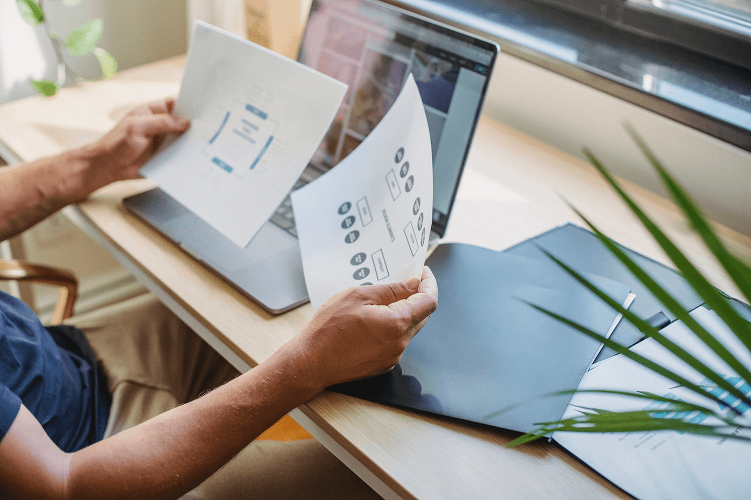 A web developer working on a website plan