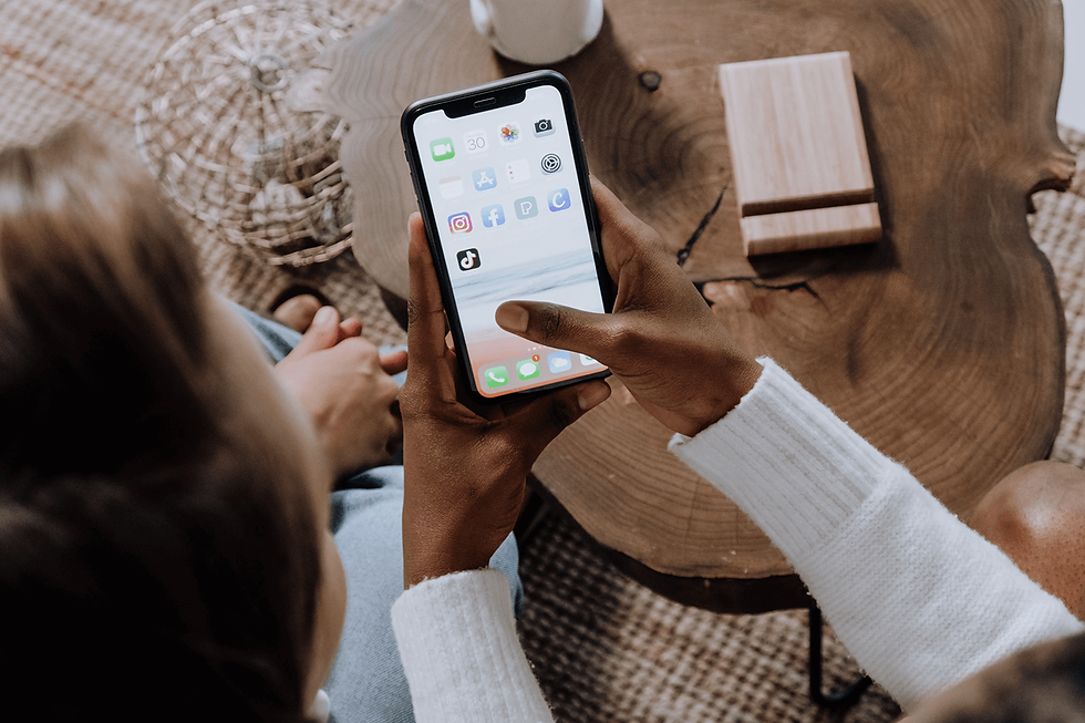A person using a mobile device to interact with a mobile app