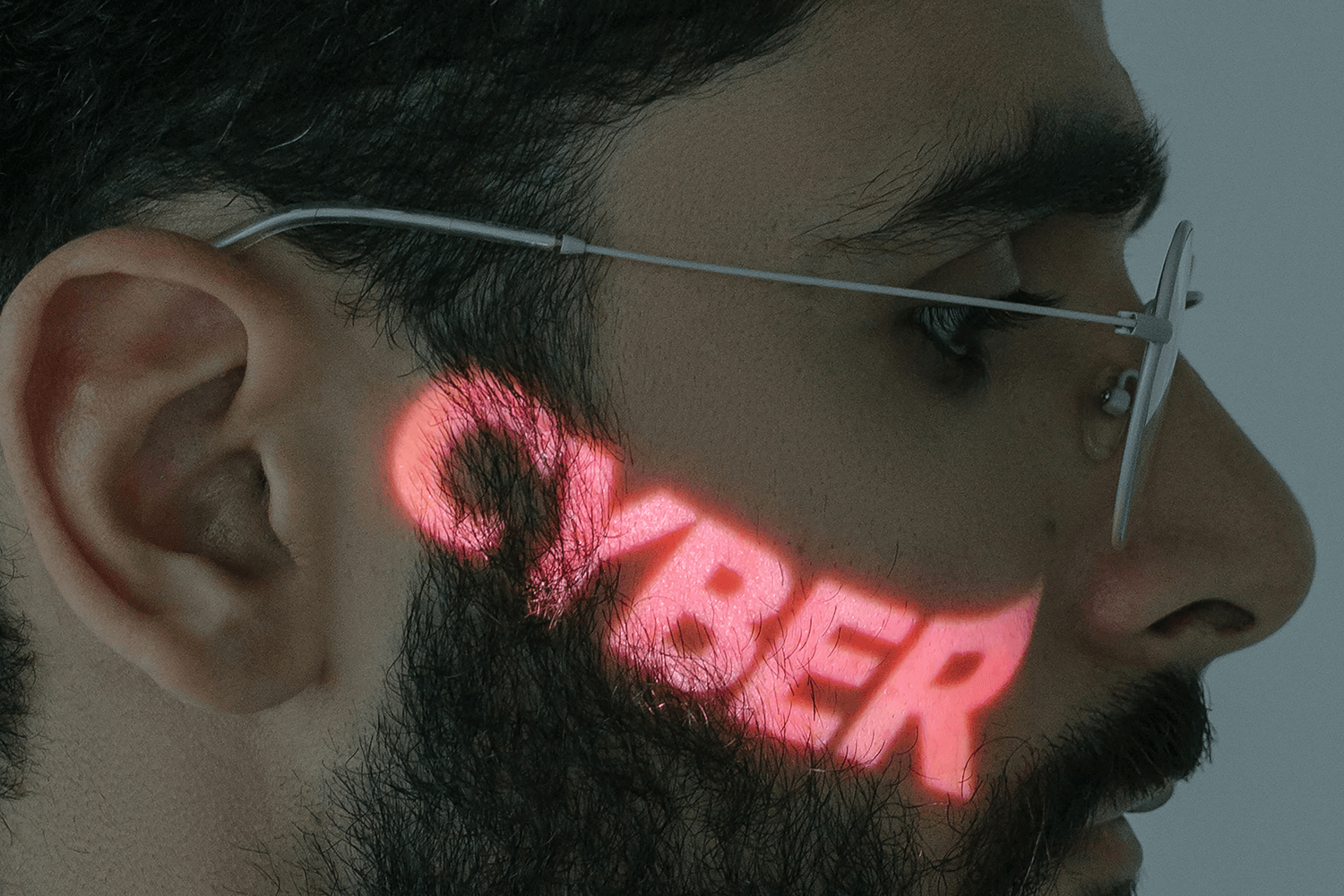 A person with the words cyber on their face