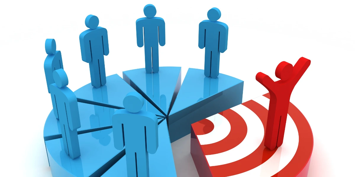 A 3D illustration showing a sliced pie with people standing on each slice. One slice is rendered to look like a target