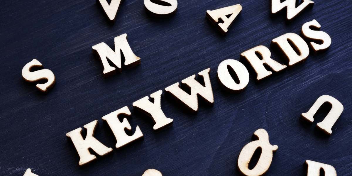 Wooden letters spelling out 'Keywords'