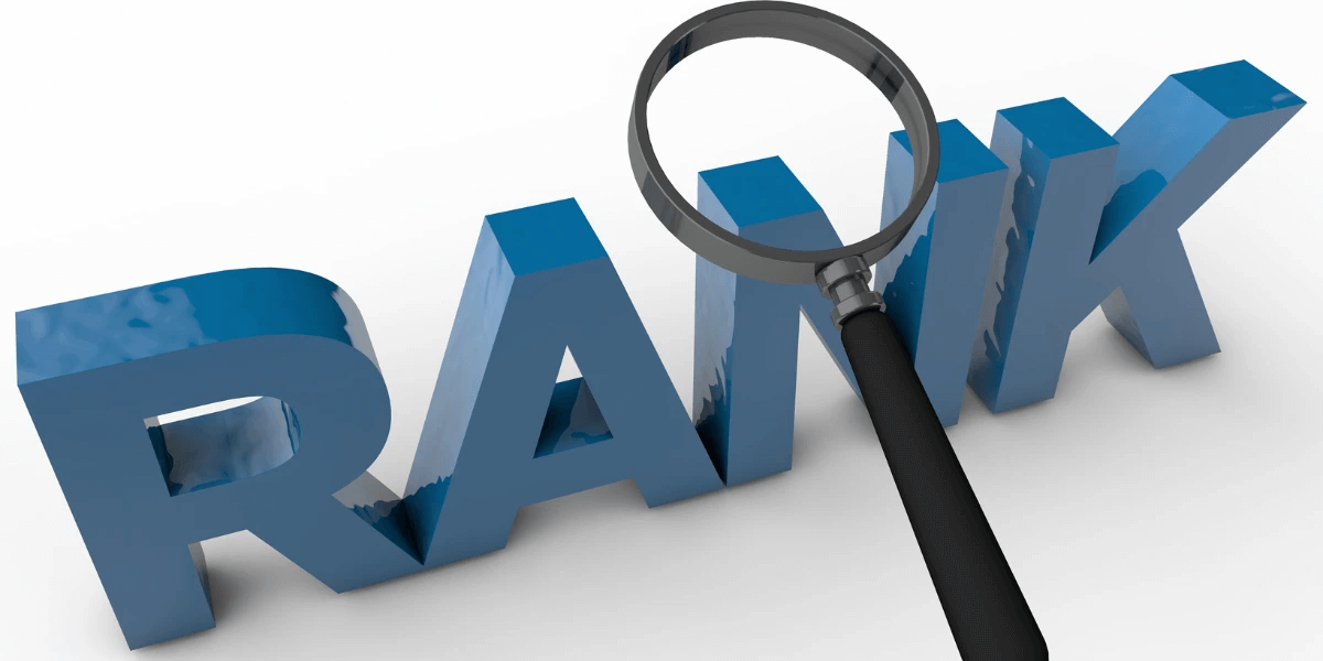 3D text of the word Rank with a magnifying glass on top and over a white background