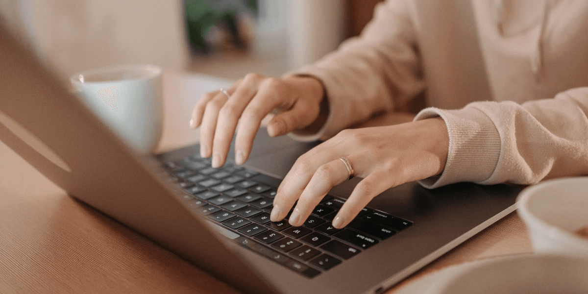A person using a laptop to research the importance of local SEO citations