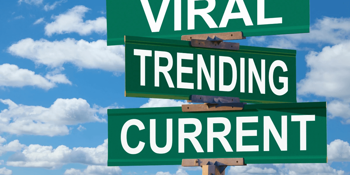 Street signs with 'Viral', Trending', and 'Current' written on them