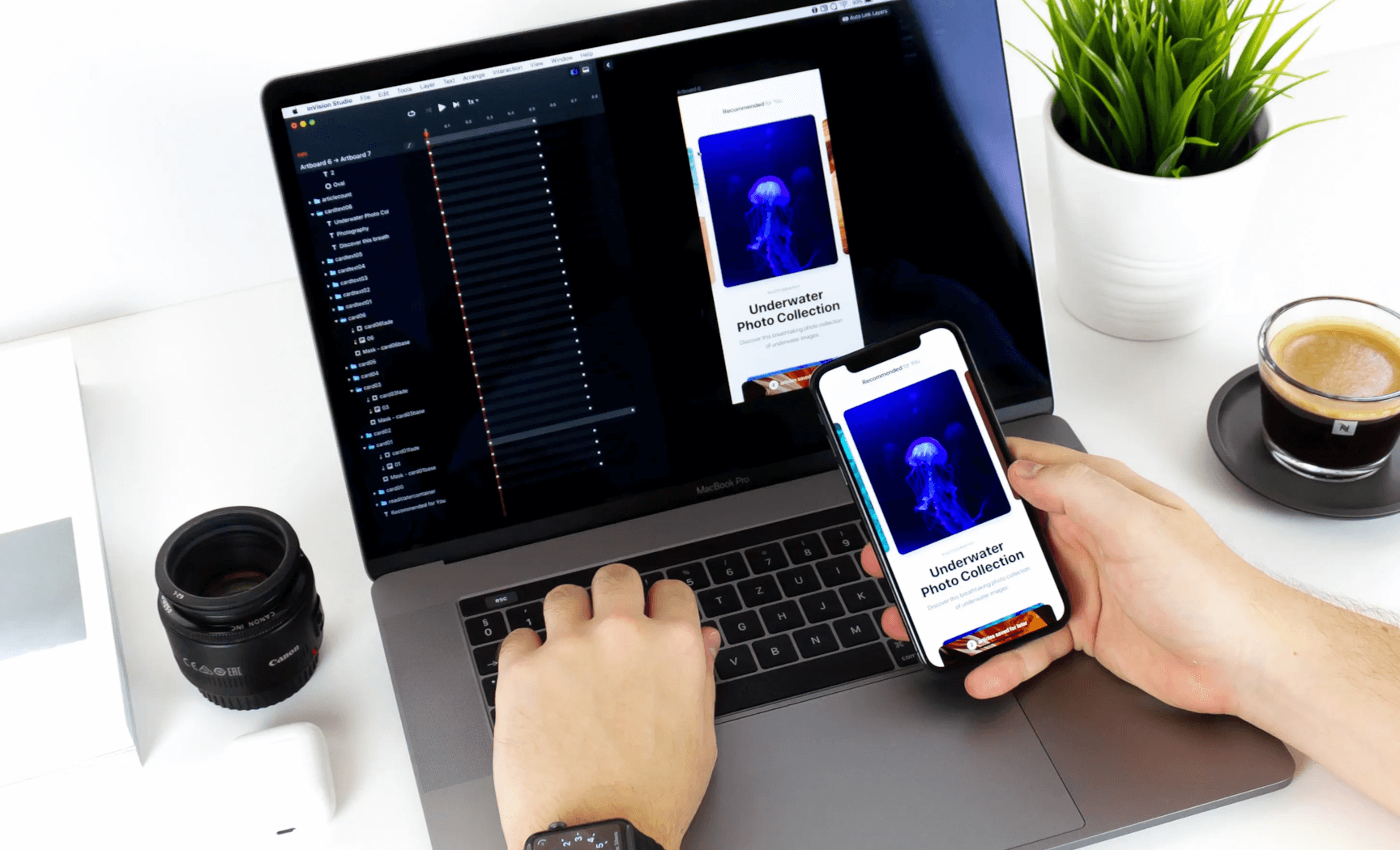 A person using a mobile device to interact with a mobile app design tool