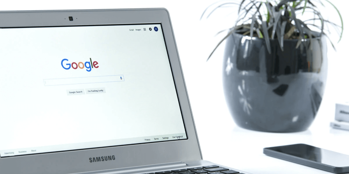 A laptop showing the Google search bar