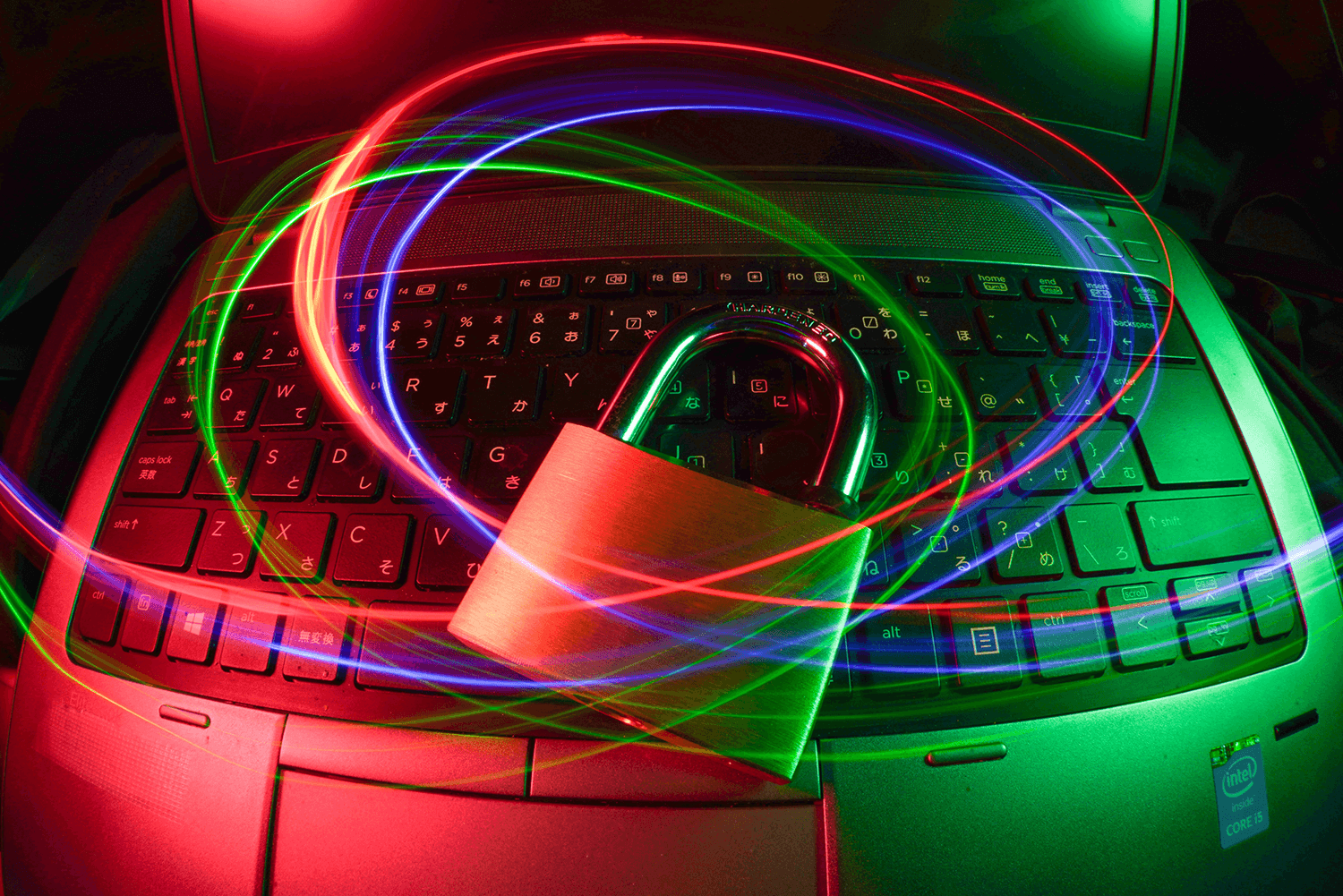 A computer with a padlock symbolizes secure website hosting