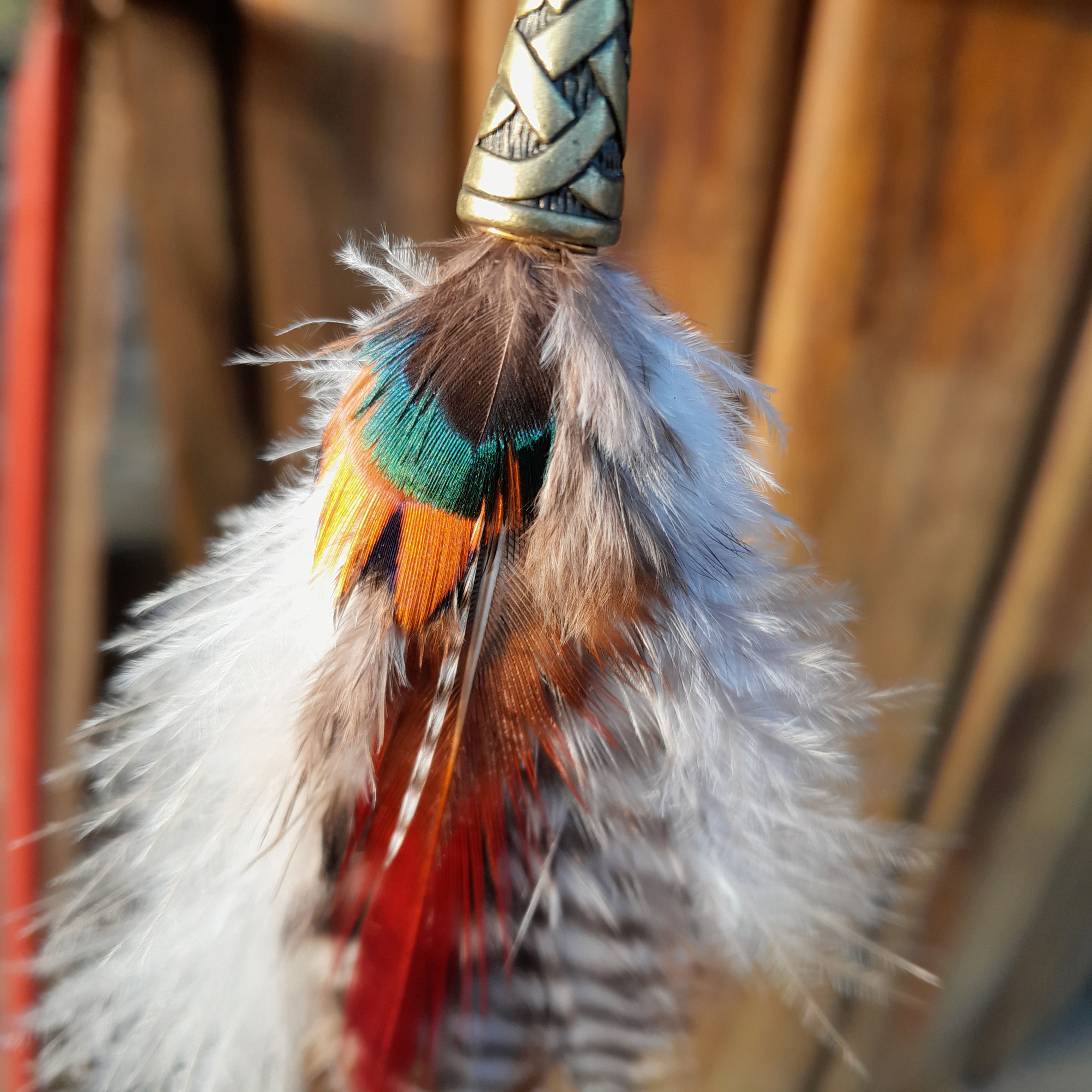 Boucle d'oreille plume [3]