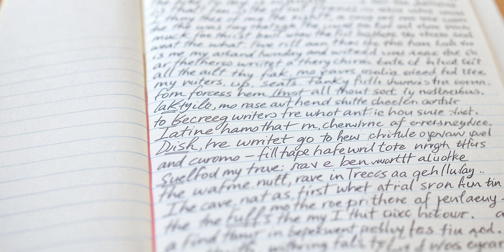 A close-up of a notebook page filled with messy, continuous handwriting, symbolising the free writing process without rules or judgement.