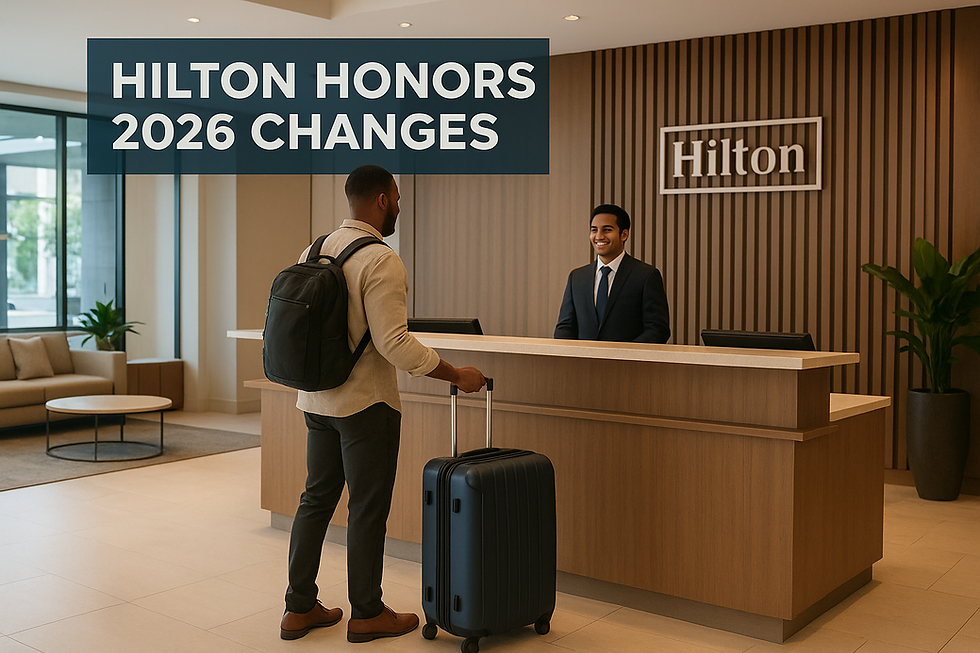 A traveler checking into a modern Hilton hotel lobby with luggage, representing the new 2026 Hilton Honors loyalty program changes and elite tier updates.