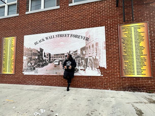 REDDZSHOW visiting Black Wall Street in Tulsa during a travel adventure