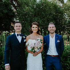 Sarah and Phil at their wedding ceremony with Benn Stone, their Melbourne cityside celebrant, enjoying a seamless and professionally coordinated celebration. The couple appreciates Benn's attention to detail and his ability to keep the ceremony smooth and fun, making their special day unforgettable as a trusted wedding celebrant in Melbourne.