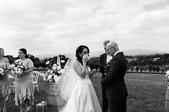Kate and Bryan with Benn Stone, their Melbourne cityside celebrant, after their unforgettable wedding day. The couple praises Benn for his exceptional work as their celebrant, MC, and DJ, blending professionalism with a relaxed, fun vibe. They describe him as a 'wedding whisperer' for his ability to understand their needs and exceed their expectations, highlighting his expertise as a trusted wedding celebrant in Melbourne.
