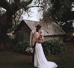 Emma and James with Benn Stone, their Melbourne cityside celebrant, after their seamless wedding day. The couple thanks Benn for his organization and easygoing nature, making the entire process stress-free. They praise his work as their celebrant, MC, and DJ, highlighting how professional and personable he was, making everyone feel like old friends. His music kept guests of all ages on the dance floor, showcasing his expertise as a top wedding celebrant in Melbourne.