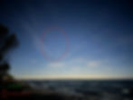 Multiple objects in photograph of twilight sky.