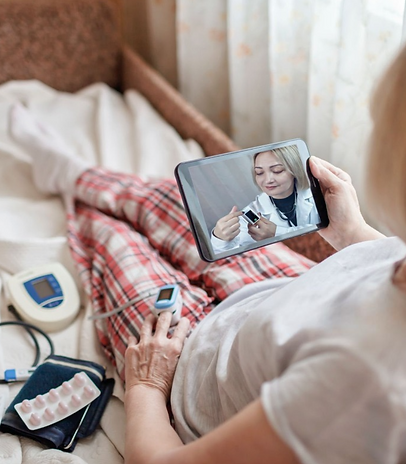 Patient in bed with clinicians on call