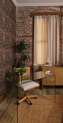 A picture of a desk and a chair at McQueen Massage Studio.