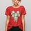 Thumbnail: Model wearing the Rose Heart Floral T-shirt in red
