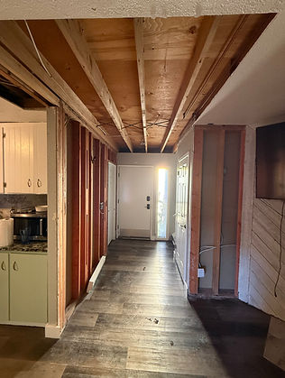 Completed interior demolition by Peak Environmental after containment and dust-control equipment were removed.