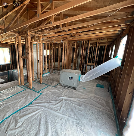 Peak Environmental asbestos containment with HEPA negative air equipment