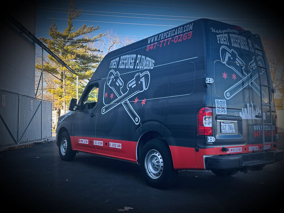 First Response Plumbing van with a full vinyl wrap, rear three-quarter view