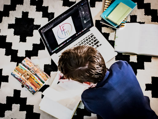 hillary_eden_mcmullen_overhead_shot_working_on_marketing