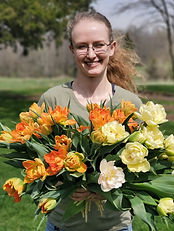 Shyanne with a tulip harvest