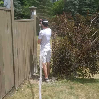 spraying exterior paint