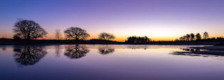 Panoramic sunrise Mogshade Pond, New Forest