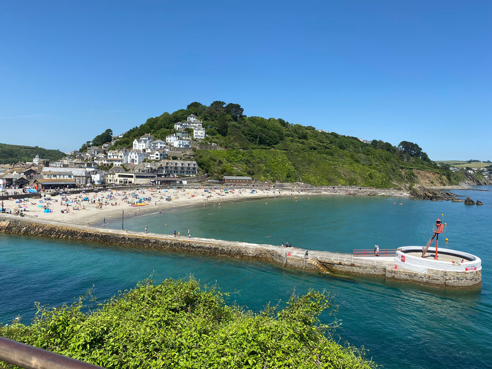 Looe beach, Banjo Pier and the town beyond.