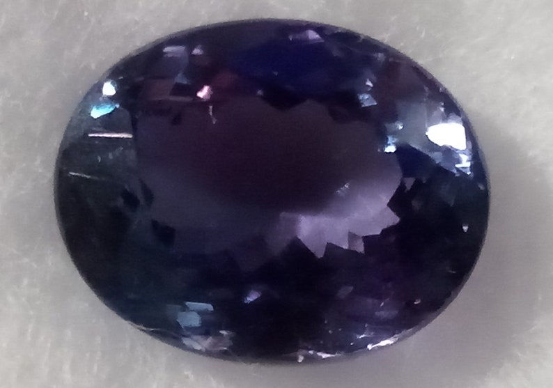 Miniature : Authentic TANZANITE 3.61 carat Bluish-Violet Oval Faceted AAA IF