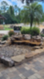 Medium Pond with Waterfaat Ever's Wood Products in St