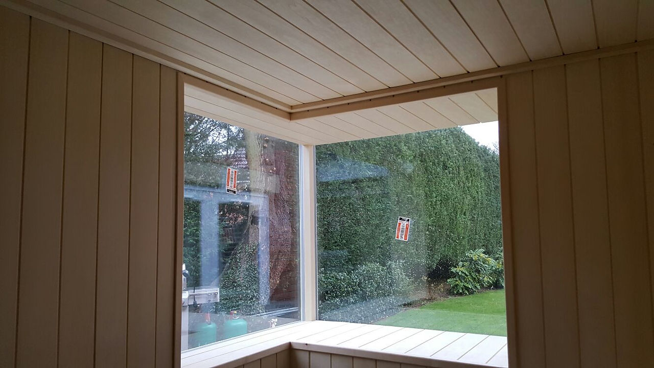 Sauna cladding around window