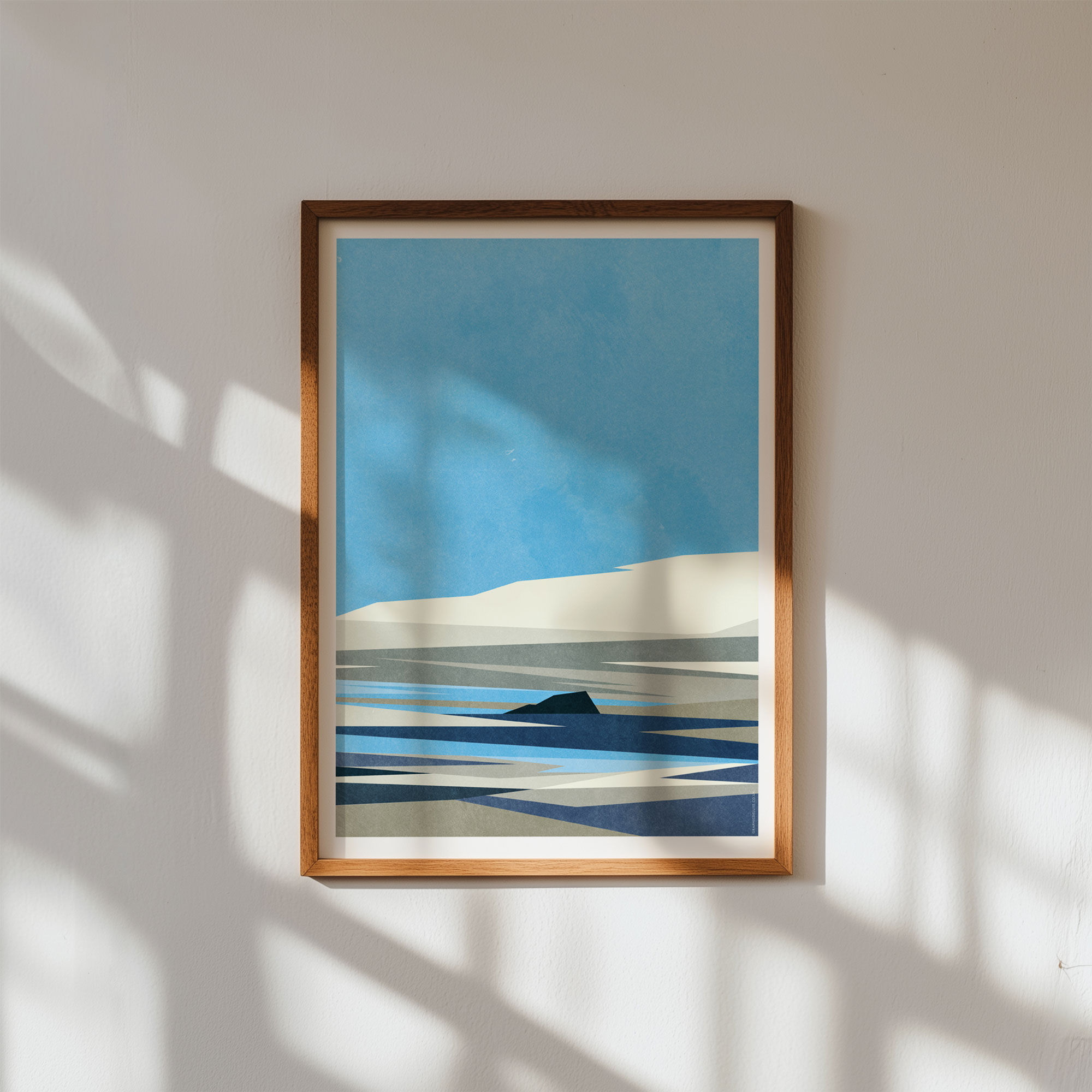 Framed coastal wall art with sand dunes and tidal water patterns, modern seascape print in blue and neutral tones